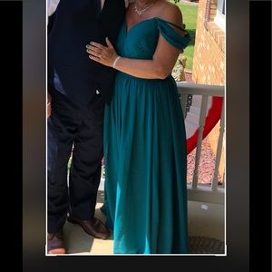 Beautiful teal evening gown worn once for my sons wedding. Chiffon. Sz altered